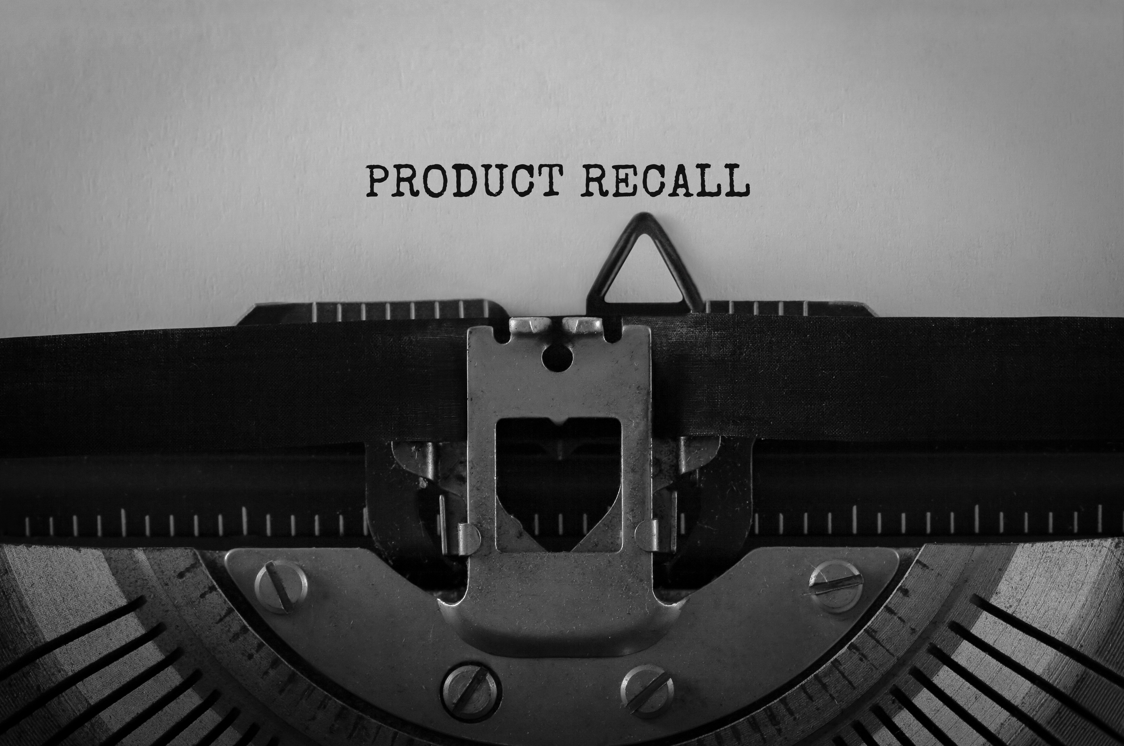 Text Product Recall typed on retro typewriter